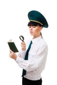 Customs control worker carefully check documents