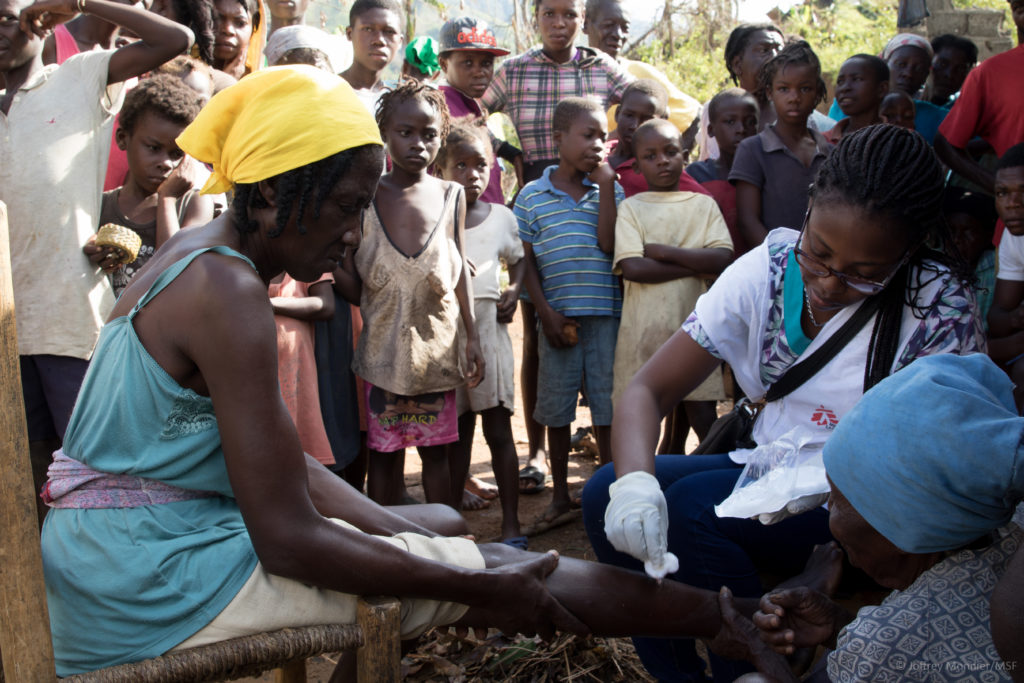 Cassandre Saint-Hubert MSF nurse (from Haiti) treats a patient at a Medecins Sans Frontieres (MSF) mobile clinic in the village of Nan Sevre, in the mountains north of Port-à-Piment. The village is accessible only by helicopter since Hurricane Matthew devastated the country.